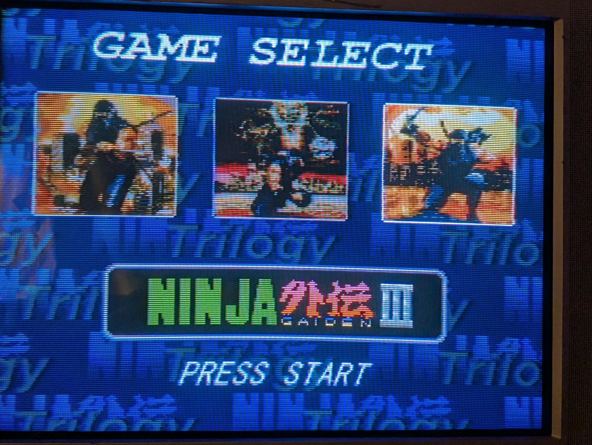 Game select screen showing all three games with the third game selected. Game select screen showing all three games with the third game selected.