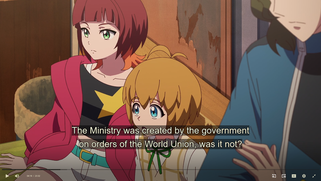 Two animated characters are engaged in a conversation in what appears to be a room with a warm, earth-toned wall. The character on the left has vibrant red hair, is wearing a red jacket with black and yellow accents, and has a thoughtful expression. She is sitting next to a smaller character with light blonde hair, who is dressed in a light-colored outfit with green accessories and a yellow star emblem on his chest. The smaller character looks attentive and curious. A partially visible third character in a blue outfit stands nearby, holding a microphone or similar device. Text overlay on the scene reads, "The Ministry was created by the government on orders of the World Union, was it not."