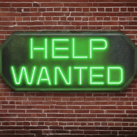 An AI generated image of a green neon sign that says help wanted and the sign is hanging on a brick wall.