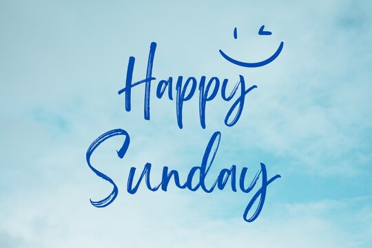 An image that says happy Sunday in a thin blue font that appears to have been written by a marker. The background is nothing but clouds. 
