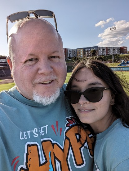 A photo I took of my beautiful wife and myself at the Truist stadium here in Winston Salem, NC as we went to the Winston Salem Hype Hens baseball game.
