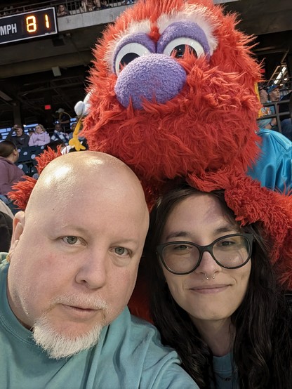A photo I took of myself, my wife and Bolt, the mascot for the Winston Salem Dash baseball team.