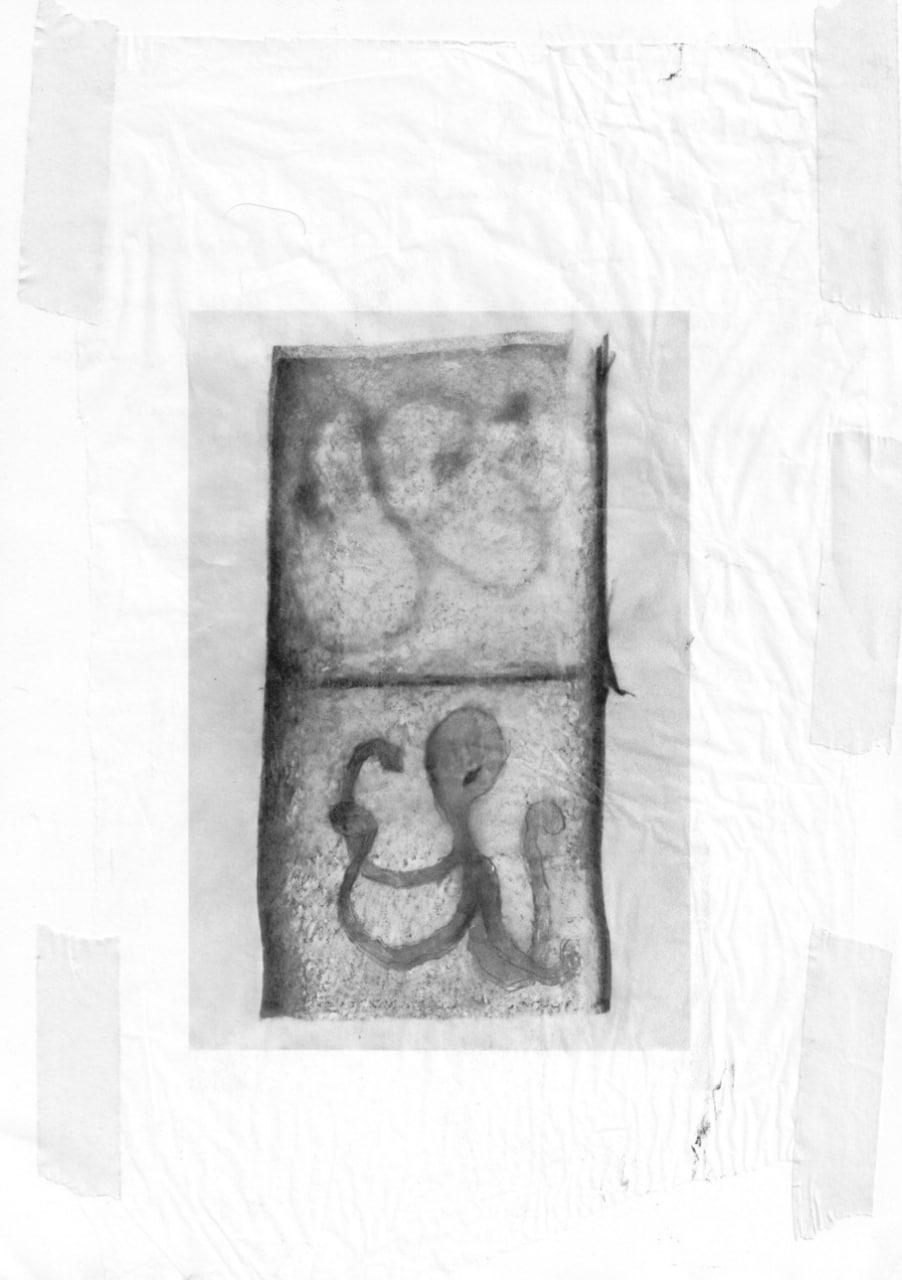 A grey drawing taped to a white background A grey drawing taped to a white background