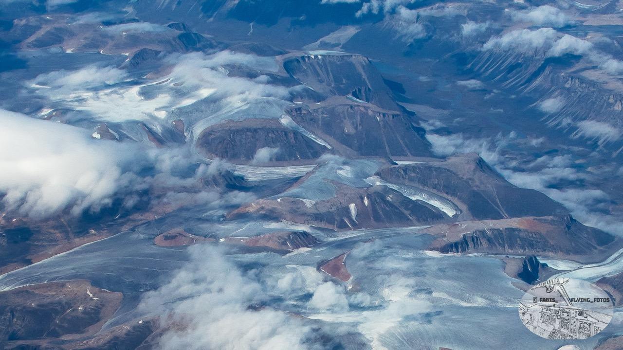 Close view on some mountains and a valley somewhere in northern Canada