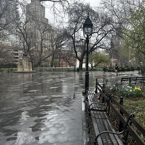 NYC Rainy day. Empty Washington Square Park.