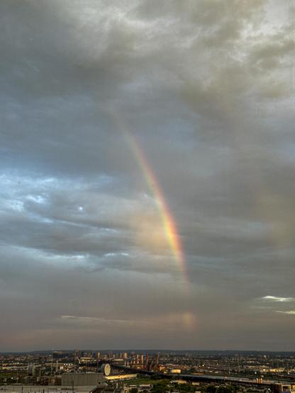 Half a rainbow over the morning sky of Jersey City. 