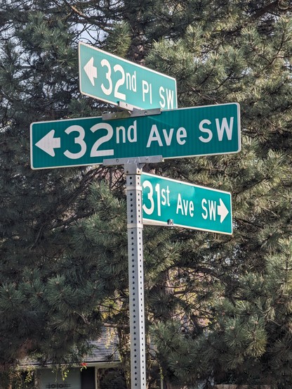 A single street corner sign, with 
- 32nd PL pointing toward the camera
- 31st Ave pointing away from the camera
- 32nd Ave pointing off to the left 

32nd PL seems to be aligned with 31st Ave

32nd Ave seems to meet at right angles with 31st Ave

For those of us operating with a grid system in mind (as suggested by numbering the avenues) this is VERY CONFUSING