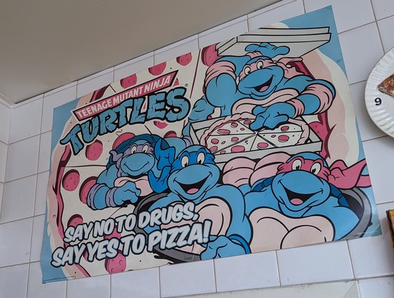 Teenage mutant ninja turtles poster 
 saying

SAY NO TO DRUGS
SAY YES TO PIZZA