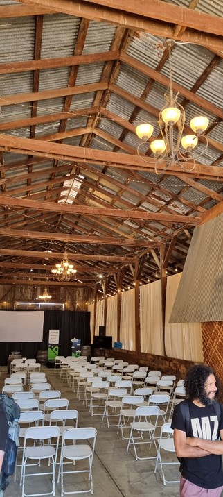 A picture of the barn at Reis River Ranch in Sonoma County, California, set up for the North Bay Python Conference