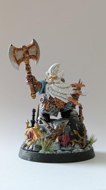 Miniature dwarf in little hill sounded by his dead enemys