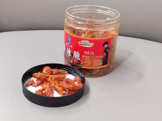 Here we have the jar opened and some of the contents poured into the lid for inspection.  This is very dry, and very crisp and it will burn like Hell if you're not immune to pepper.