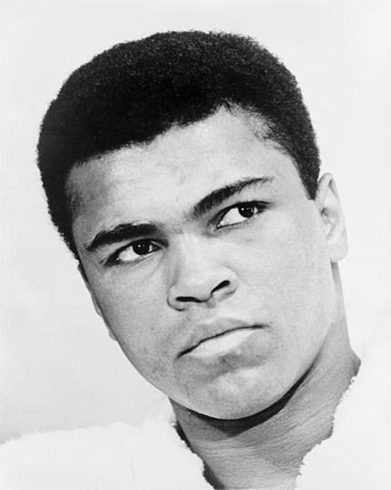 Bust photographic portrait of Muhammad Ali in 1967. World Journal Tribune photo by Ira Rosenberg. By Ira Rosenberg - This image is available from the United States Library of Congress&#039;s Prints and Photographs divisionunder the digital ID cph.3c15435.This tag does not indicate the copyright status of the attached work. A normal copyright tag is still required. See Commons:Licensing for more information., Public Domain, https://commons.wikimedia.org/w/index.php?curid=1306798