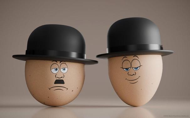 two light brown eggs in a pair of bowler hats in a style after Laurel and Hardy.