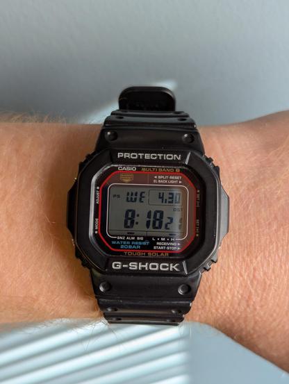A black Casio G-Shock GWM5610.