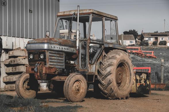 Old Leyland tractor alongside shed