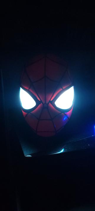 Spider-Man cake from a cake, with glowing eyes in the dark.