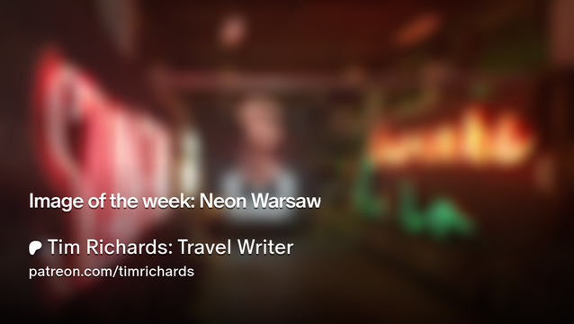 Deliberately blurred screenshot of a photo of the Warsaw Neon Museum.