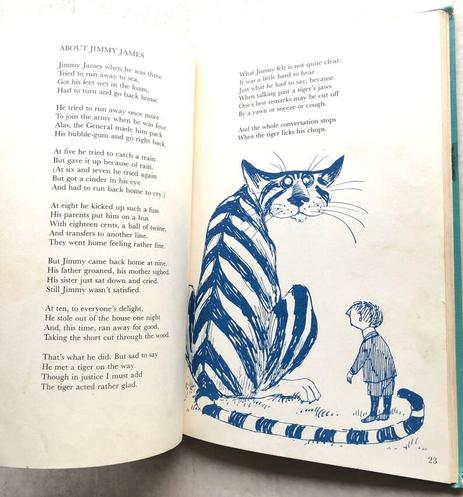 An open book is shown as an example of an illustration of a large cat. This threatening looking feline was duplicated as a tattoo on my daughter and on myself, right arm, inside of the bicep. It was drawn by Edward Gorey!