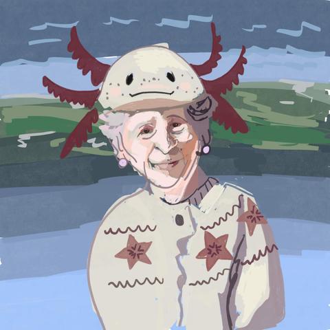 An old woman wearing a knit cardigan that's sporting a pattern of starfish and waves. She's smiling and wearing pearl earrings. On her head is a rather silly axolotl hat.