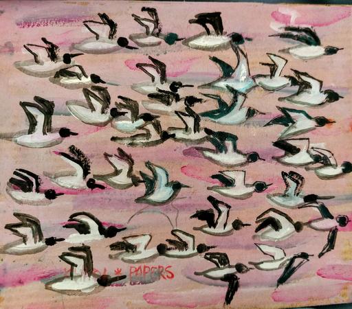 Flock of Turns flying over water