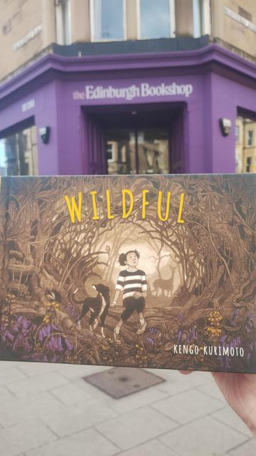 A copy of landscape format graphic novel Wildful outside the Edinburgh Bookshop