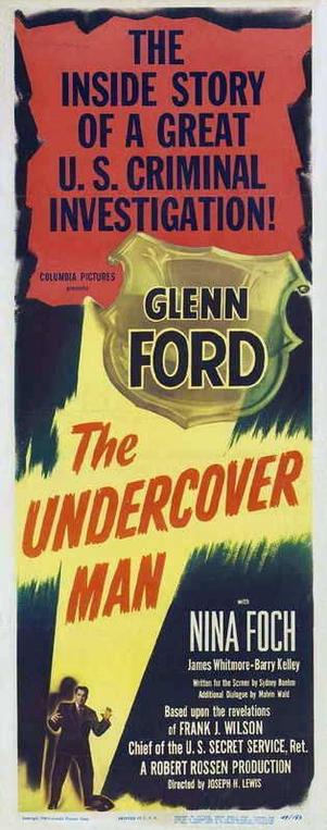 Most of the cover is text, principally "THE INSIDE STORY OF A GREAT U.S. CRIMINAL INVESTIGATION". Ford's name is in a shiny law enforcement badge. In the corner is a man highlighted by a spotlight, with his hands up as if surrendering.

Poster for the 1949 movie “The Undercover Man” starring Glenn Ford,  Nina Foch,  James Whitmore.