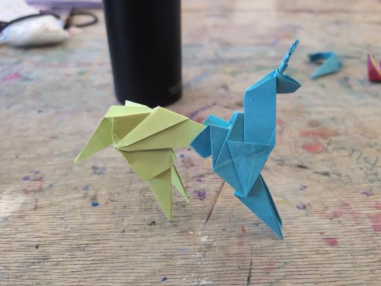 A blue and green Origami unicorn, the same style Gaff made in the original Balde Runner, though bigger (The paper wasn't thin enough).