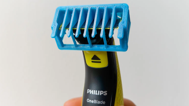 A Philips One Blade razor with a 3D printed head thingy