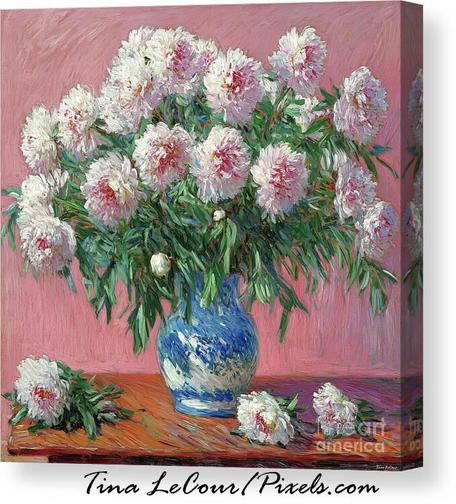This is a still life some pretty soft pink peony flowers in a blue and white ceramic vase on a table against a soft pink background.