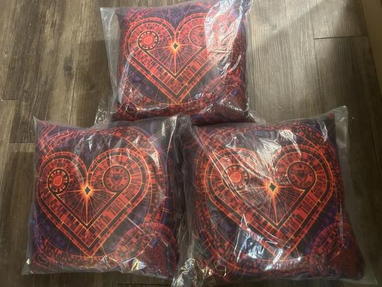3 Radiant Heart pillows still wrapped in original plastic