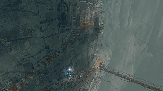 screen shot from Cairn; Aava is climbing a set of stone stairs hewn into the mountain, it's pretty narrow and there's definitely no guard rail; the cliff falls basically forever to her right, with a rope bridge extending off; there's a carved stone doorway and windows up above that the stairs lead to