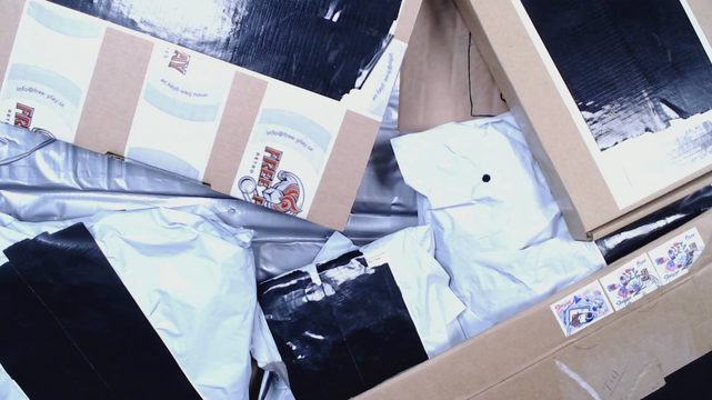 A pile of mail packages of different size and colour.