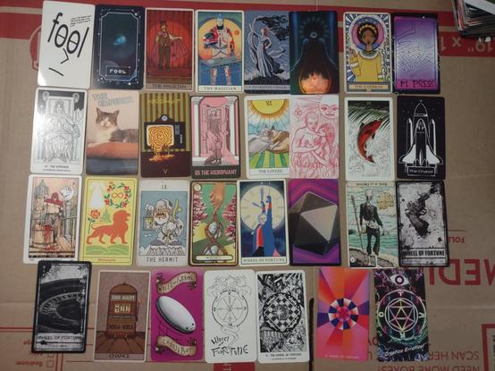 various tarot cards from various decks