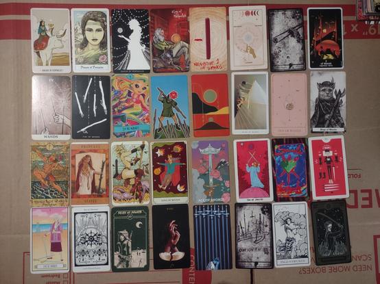 various tarot cards from various decks