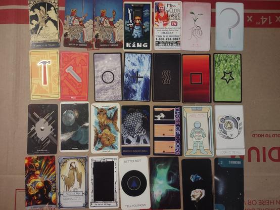 various tarot cards from various decks