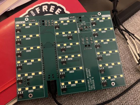Rectangular green PCB. It has three columns of LEDs labelled block 1, 2, and 3.