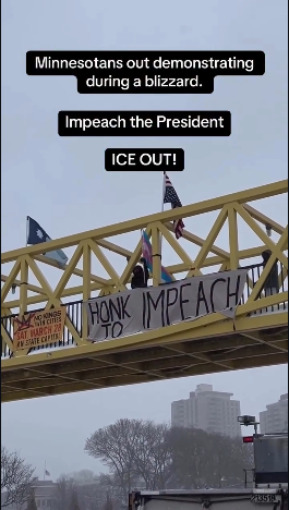 People on a yellow pedestrian bridge over a highway are protesting in bitter cold and snow with a US flag of distress, a Minnesota stage flag, a banner advertising the No Kings march on March 28th, and a banner that says "HONK TO IMPEACH"  and also a trans flag I didn't notice at first.

Text boxes says "Minnesotans out demonstrating during a blizzard. Impeach the President! ICE OUT!"