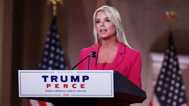 Pam Bondi speaks at a Trump 2020 podium.