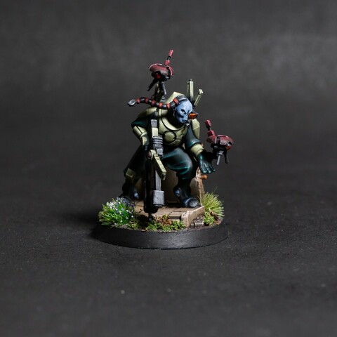 A plastic model of a sneaky alien