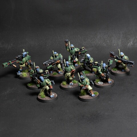 A group of plastic models of aliens 