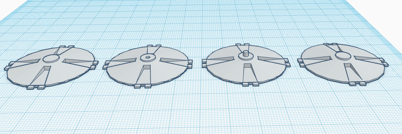 Picture of the 3D model of a scifi spaceship from the TV show Battlestar Galactica. The model is of a Cylon basestar. There are four separate parts to the model, they must be fitted together to form the circular ship.