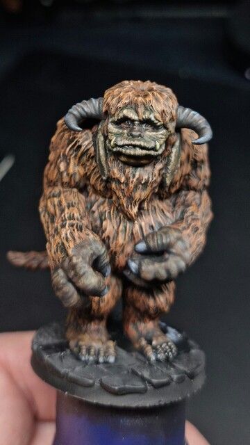 Model of ludo from the labyrinth painted very realistically, browny orange fur with horns and leather skin