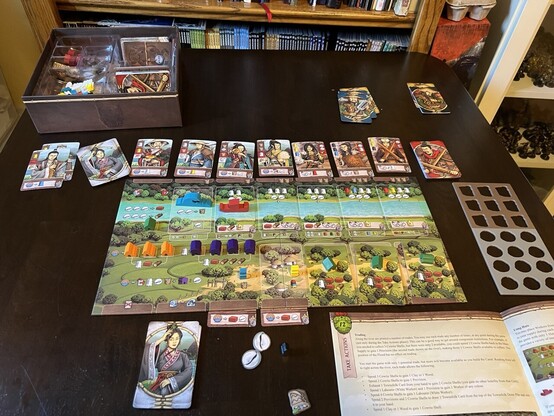 Early board state for Legacy of Yu. One canal and one hut constructed. 