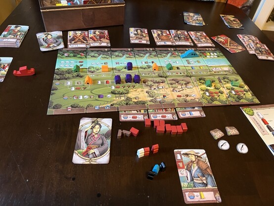 Late board state of Legacy of Yu. Only one canal left to build, but about to be overrun by barbarians. 
