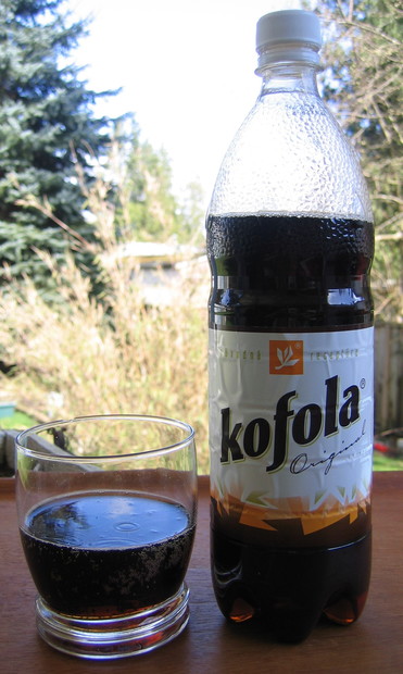 bottle and glass of Kofola