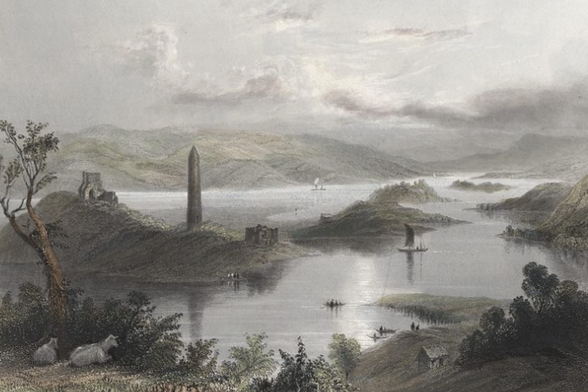 Old picture of Devenish Island, showing a ruined abbey and a round tower.