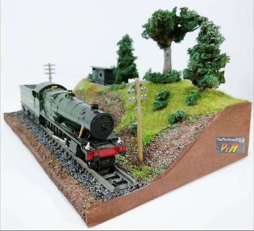 Right corner view of the N-Gauge train display base, with train.