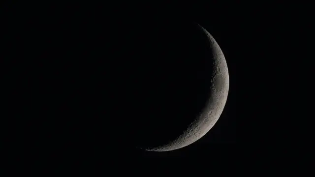 A photo of a new moon.
📷 Tavi Photo / Shutterstock
via https://www.almanac.com/what-new-moon