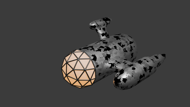 Black and silver spaceship against a dark background.
Front is a wireframed sphere, glowing peach
