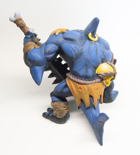 Crouching humanoid shark warrior with tooth greatsword, back side